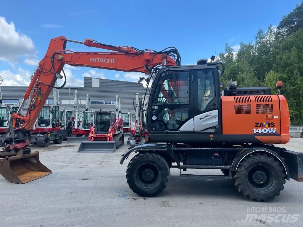 Hitachi ZX 140 W-6 Pelle sur pneus