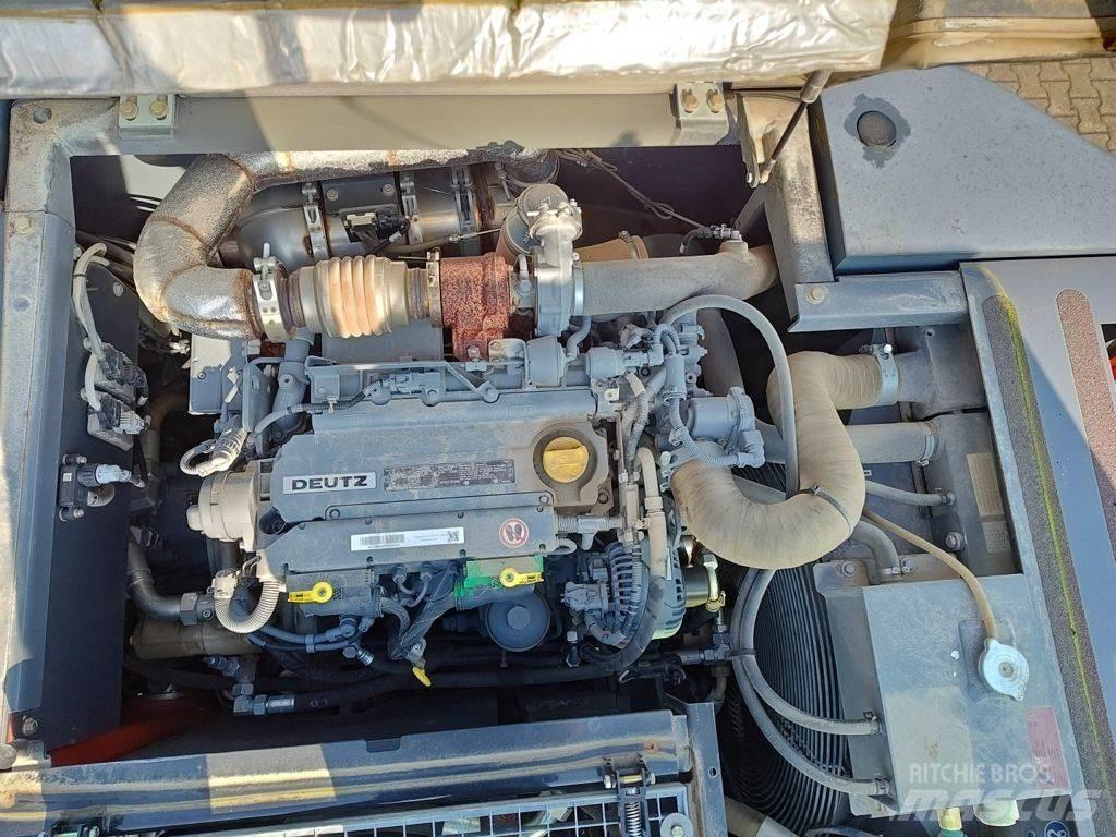 Atlas 140W Pelle sur pneus