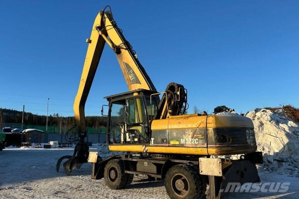 CAT M 322 C MH Pelle à déchets