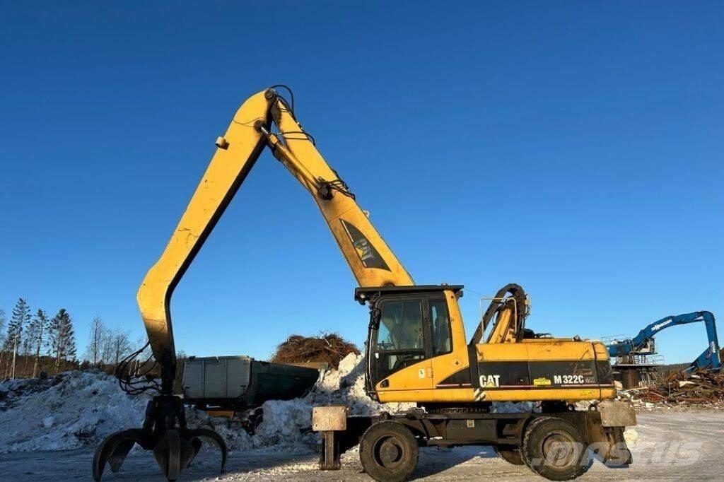 CAT M 322 C MH Pelle à déchets