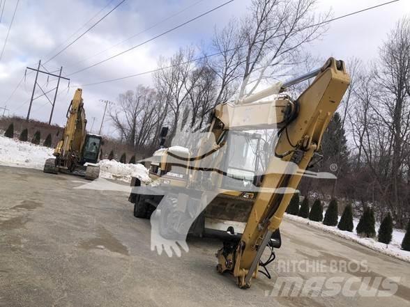 CAT M318 Pelle sur pneus