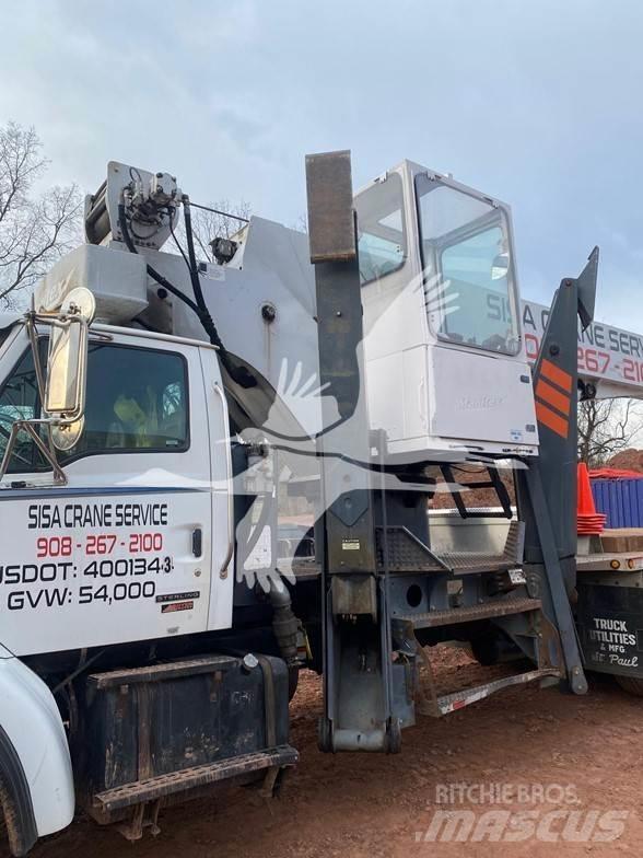 Manitex 124SX Camion plateau ridelle avec grue