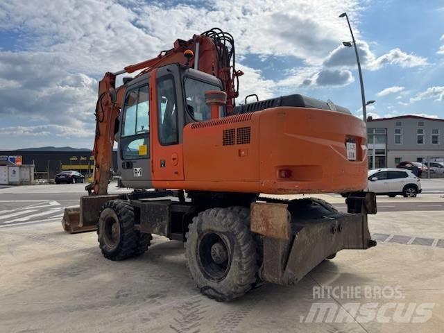 Hitachi ZX 160 W Pelle sur pneus