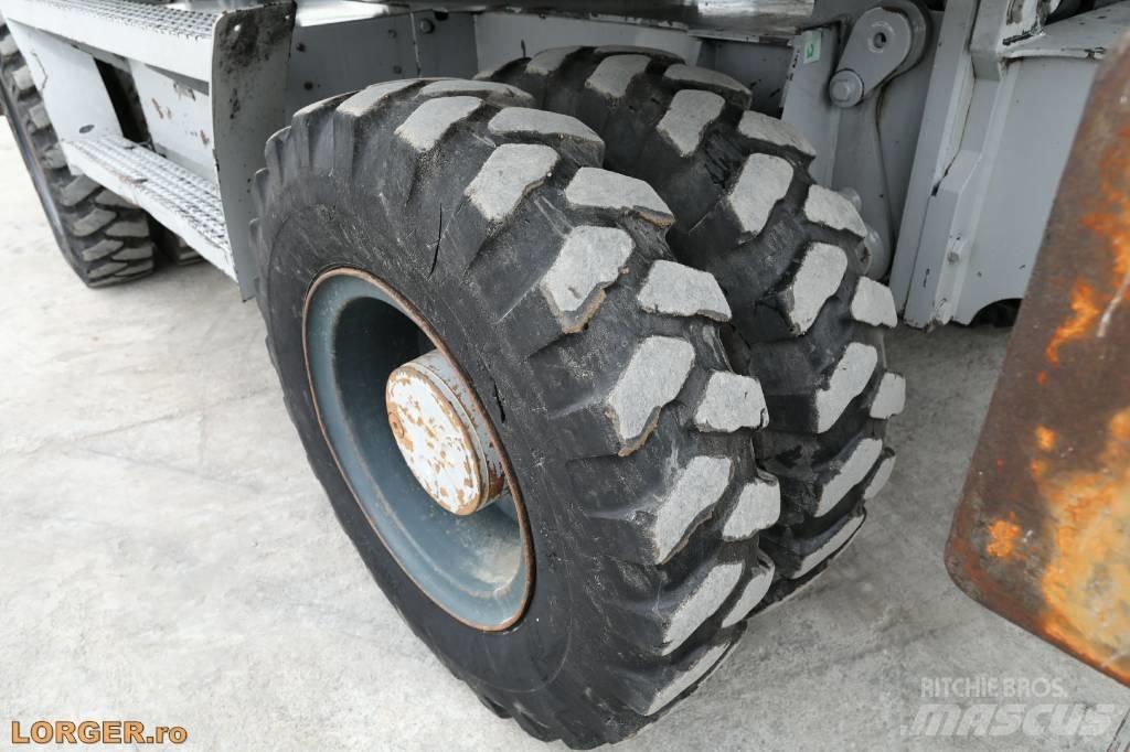 CAT M 313 D Pelle sur pneus