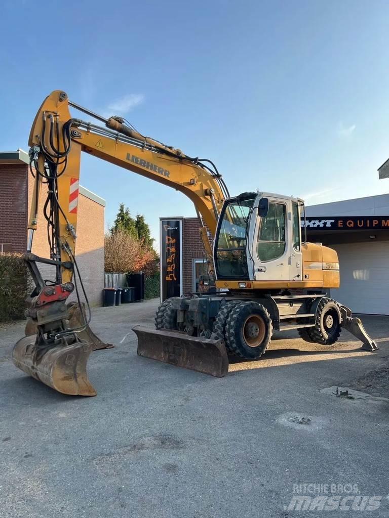 Liebherr A314 Pelle sur pneus