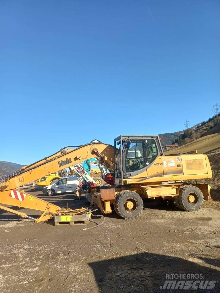 CASE 210WX Pelle sur pneus