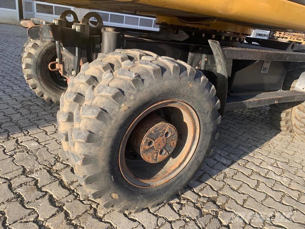 CAT M 316 D Pelle sur pneus