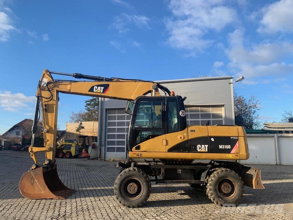 CAT M 316 D Pelle sur pneus