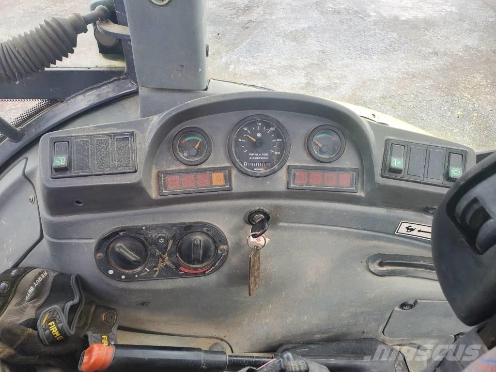 New Holland LB 75 Pelle sur pneus