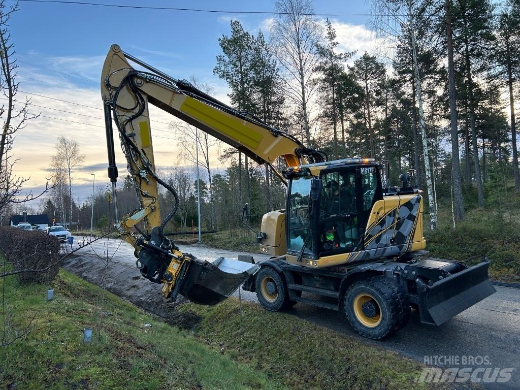 CAT M 317F Pelle sur pneus