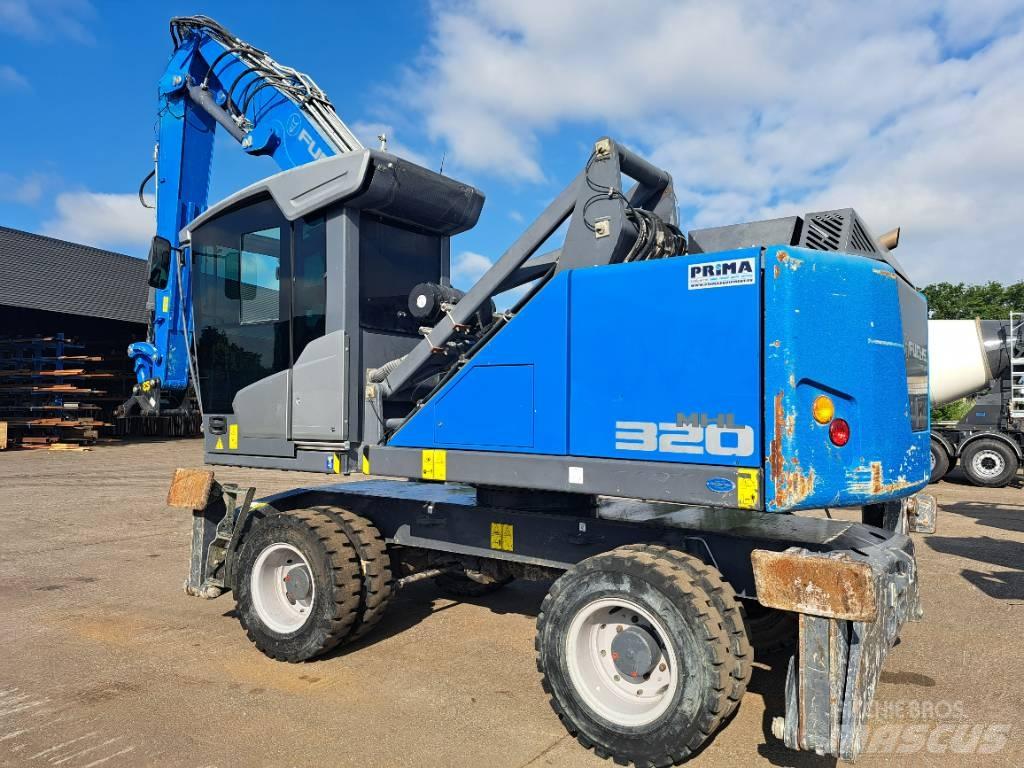 Fuchs MHL320F Pelle à déchets