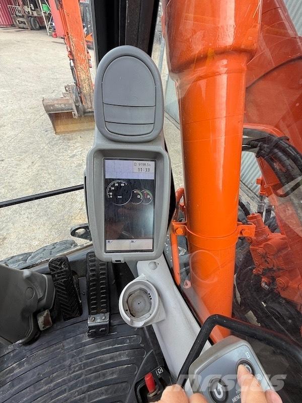 Hitachi ZX 140 W-5 Pelle sur pneus