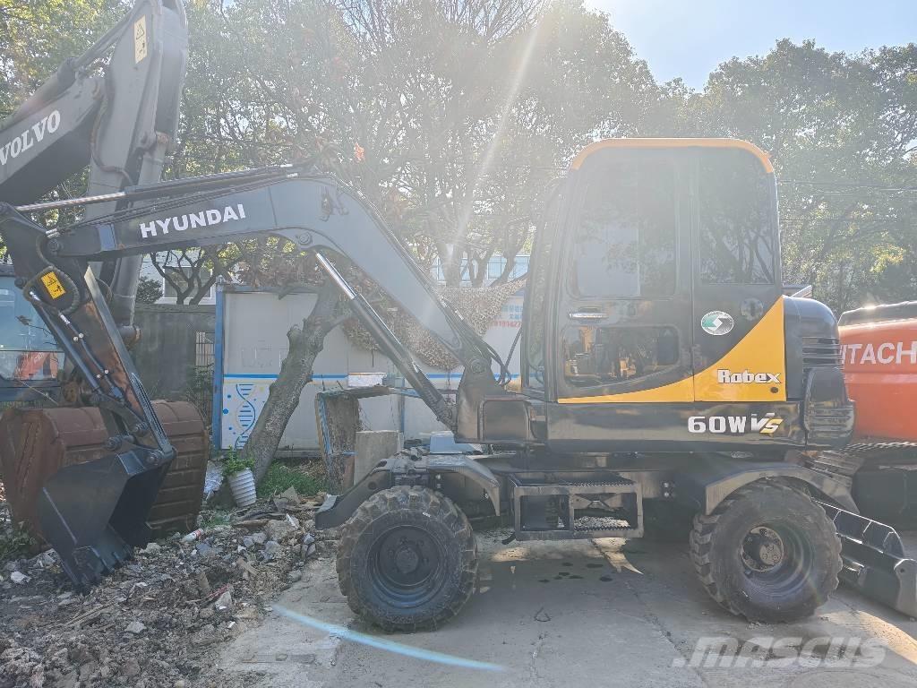 Hyundai 60 W VS Mini pelle < 7t