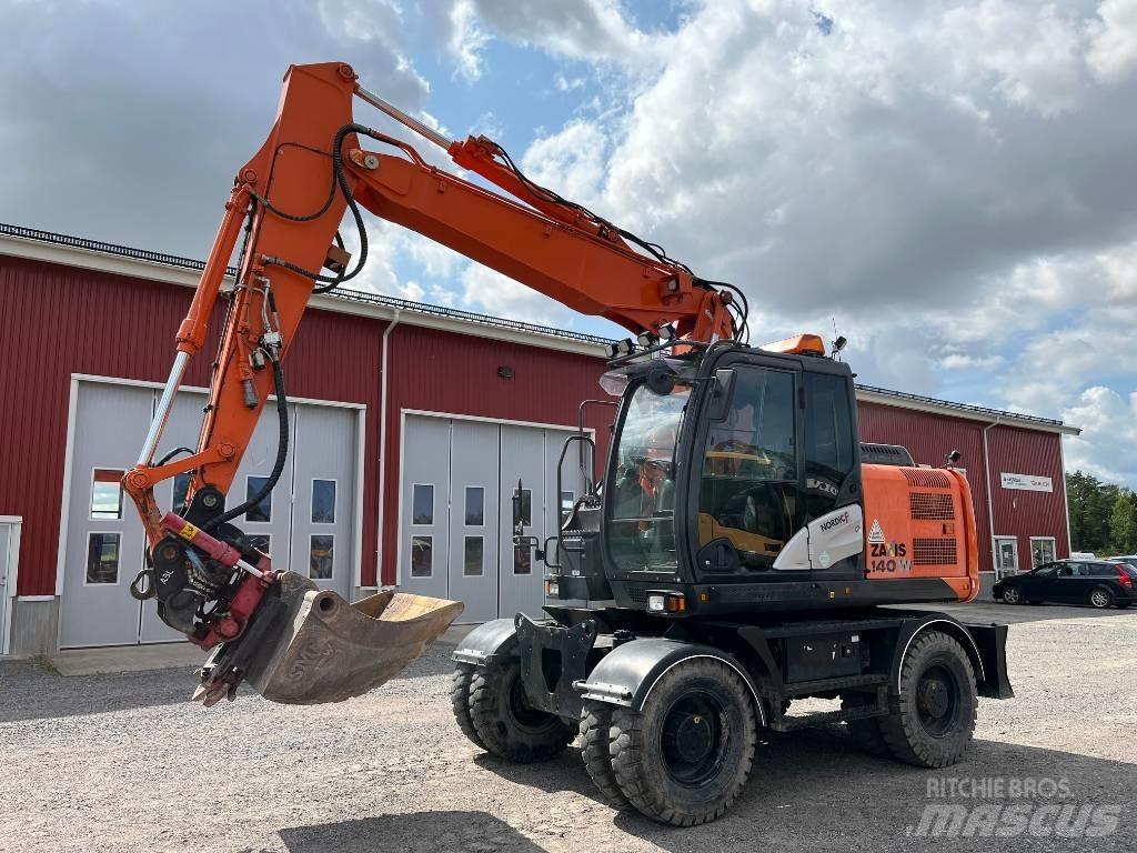 Hitachi ZX 140 W-5 Pelle sur pneus