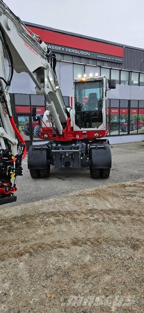 Takeuchi TB 395 W Pelle sur pneus