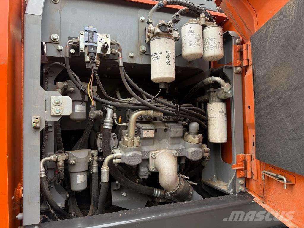 Hitachi ZX 140 W-6 Pelle sur pneus