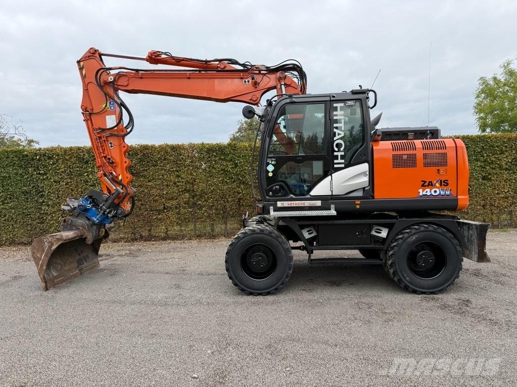Hitachi ZX 140 W-6 Pelle sur pneus