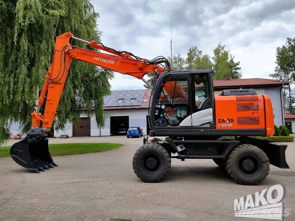 Hitachi ZX 140 W-5 Pelle sur pneus