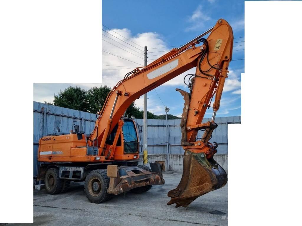 Doosan DX 210 W Pelle sur pneus