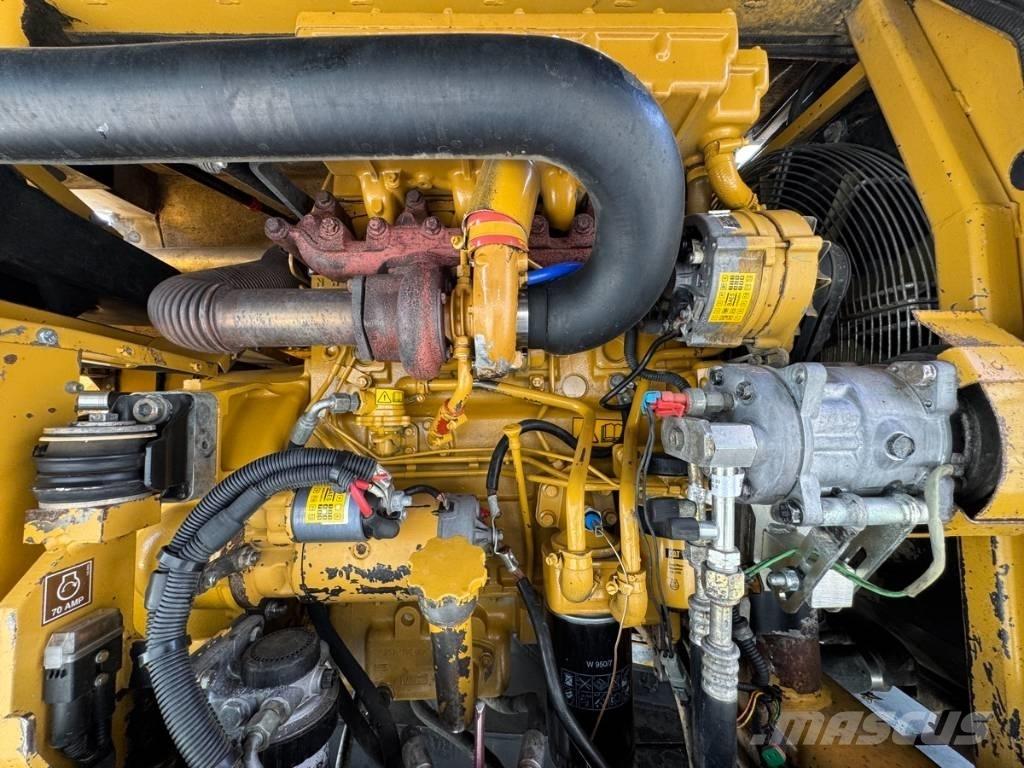 CAT M 315 Pelle sur pneus