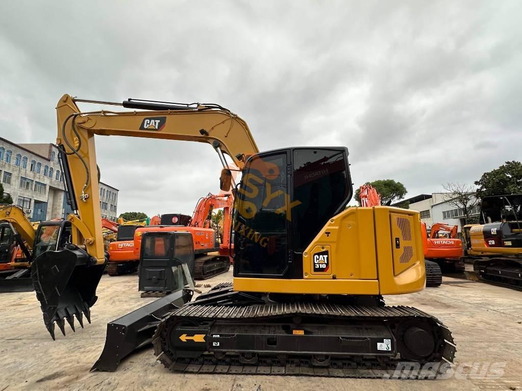 CAT 310 Mini pelle < 7t