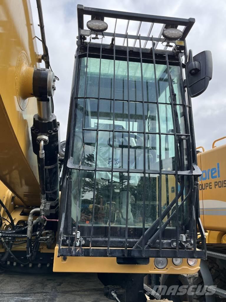 CAT MH 3024 Pelle sur pneus