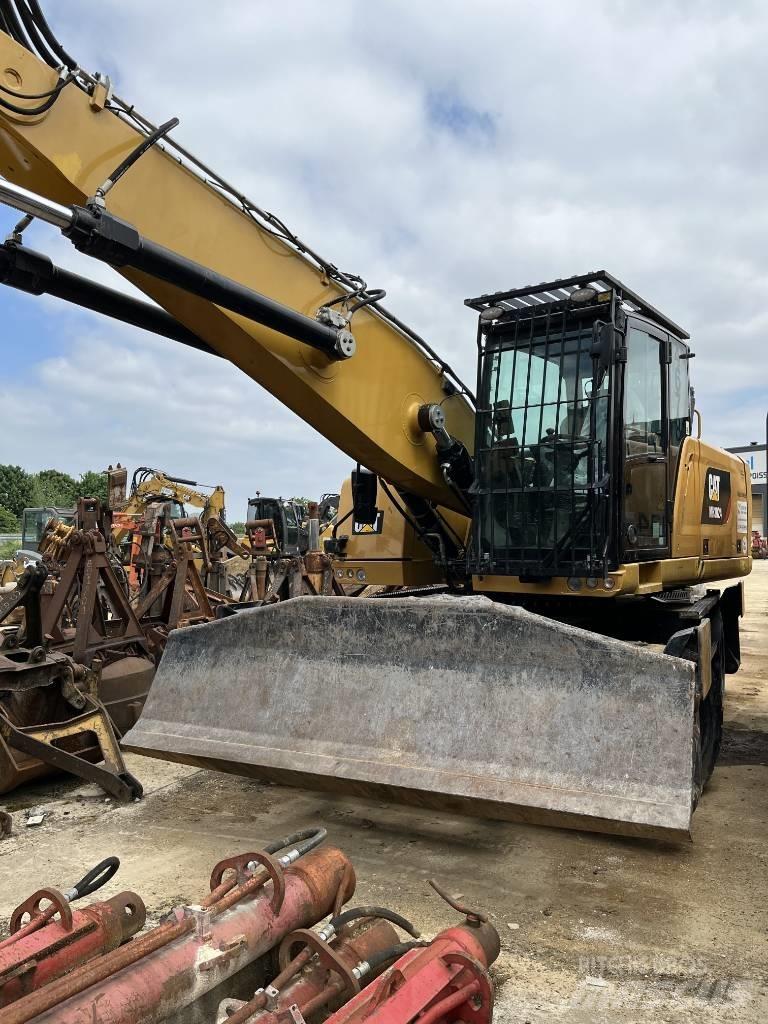 CAT MH 3024 Pelle sur pneus