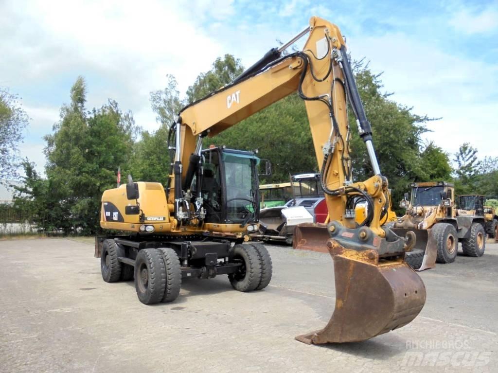 CAT M 316 D Pelle sur pneus