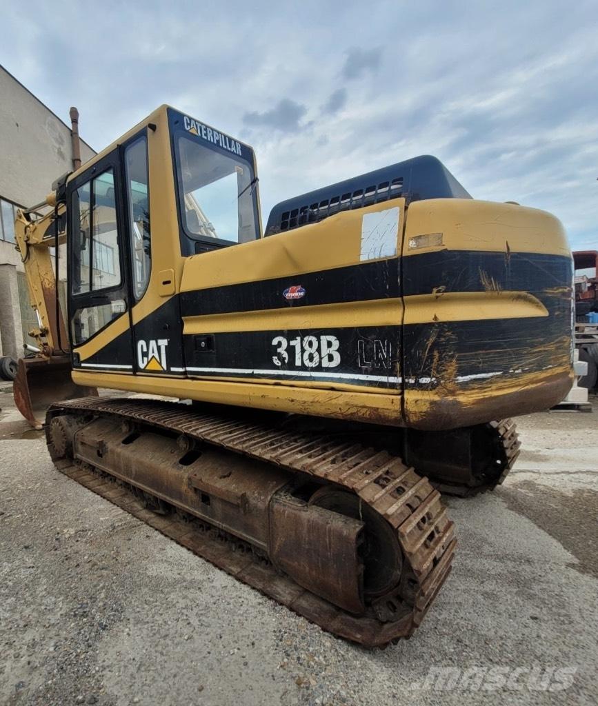 CAT 318 B LN Pelle sur chenilles