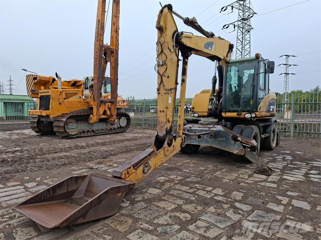 CAT M313D 4X4 Construction - Autres