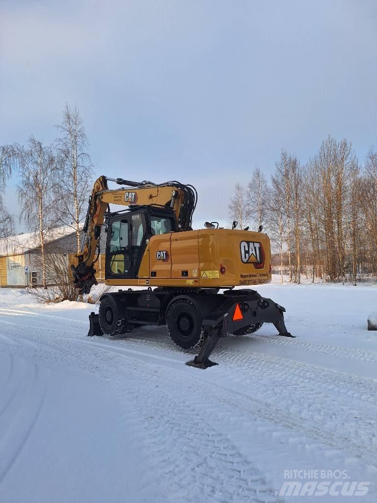 CAT M 318 Pelle sur pneus