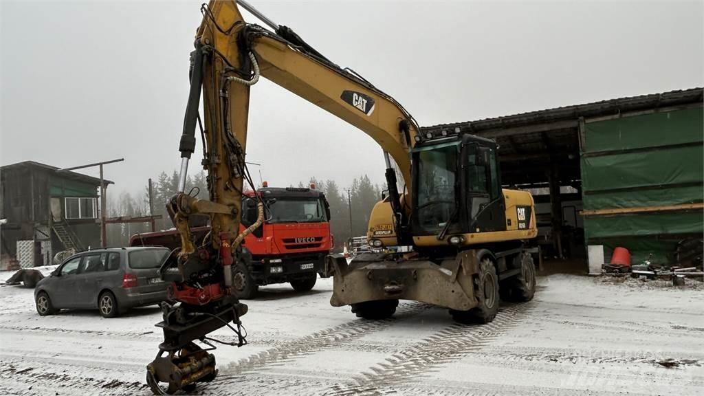 CAT 316 D Pelle sur pneus
