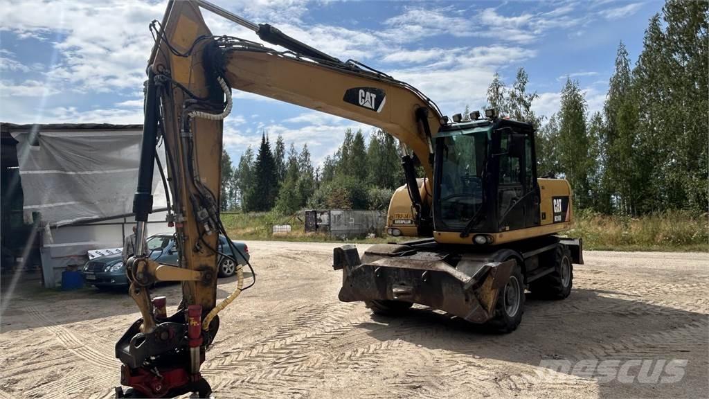 CAT 316 D Pelle sur pneus