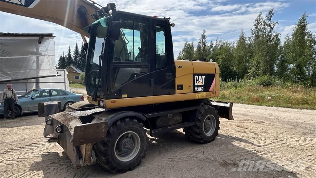 CAT 316 D Pelle sur pneus