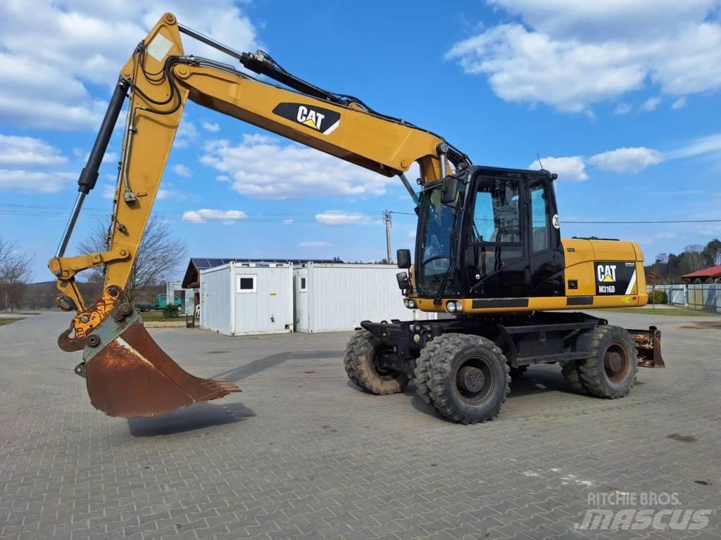 CAT M 316 D Pelle sur pneus