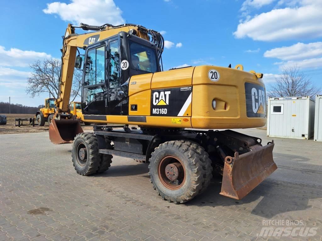 CAT M 316 D Pelle sur pneus