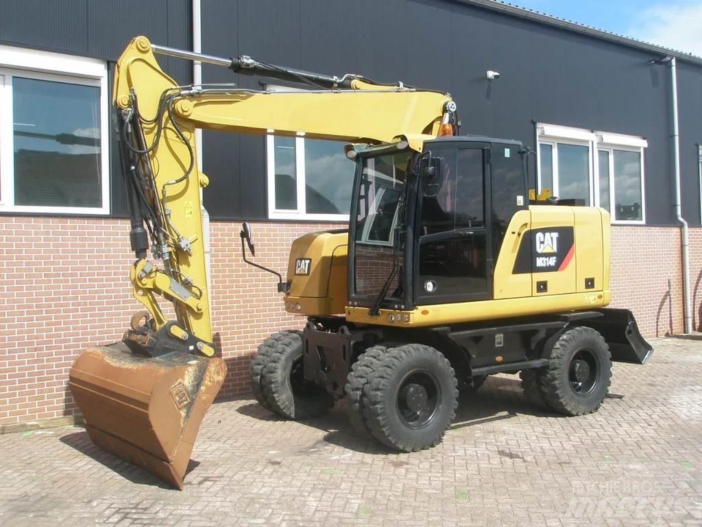 CAT M314F Pelle sur pneus