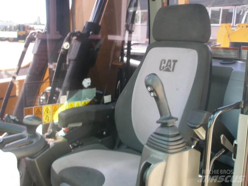 CAT M314F Pelle sur pneus