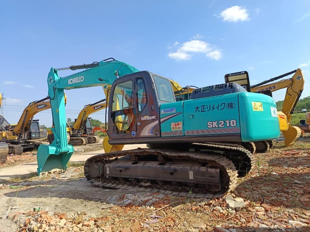 Kobelco SK210 Pelle sur chenilles