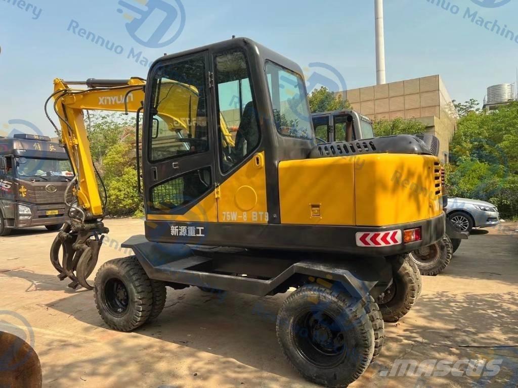Xinyuan XYB75 Pelle sur pneus