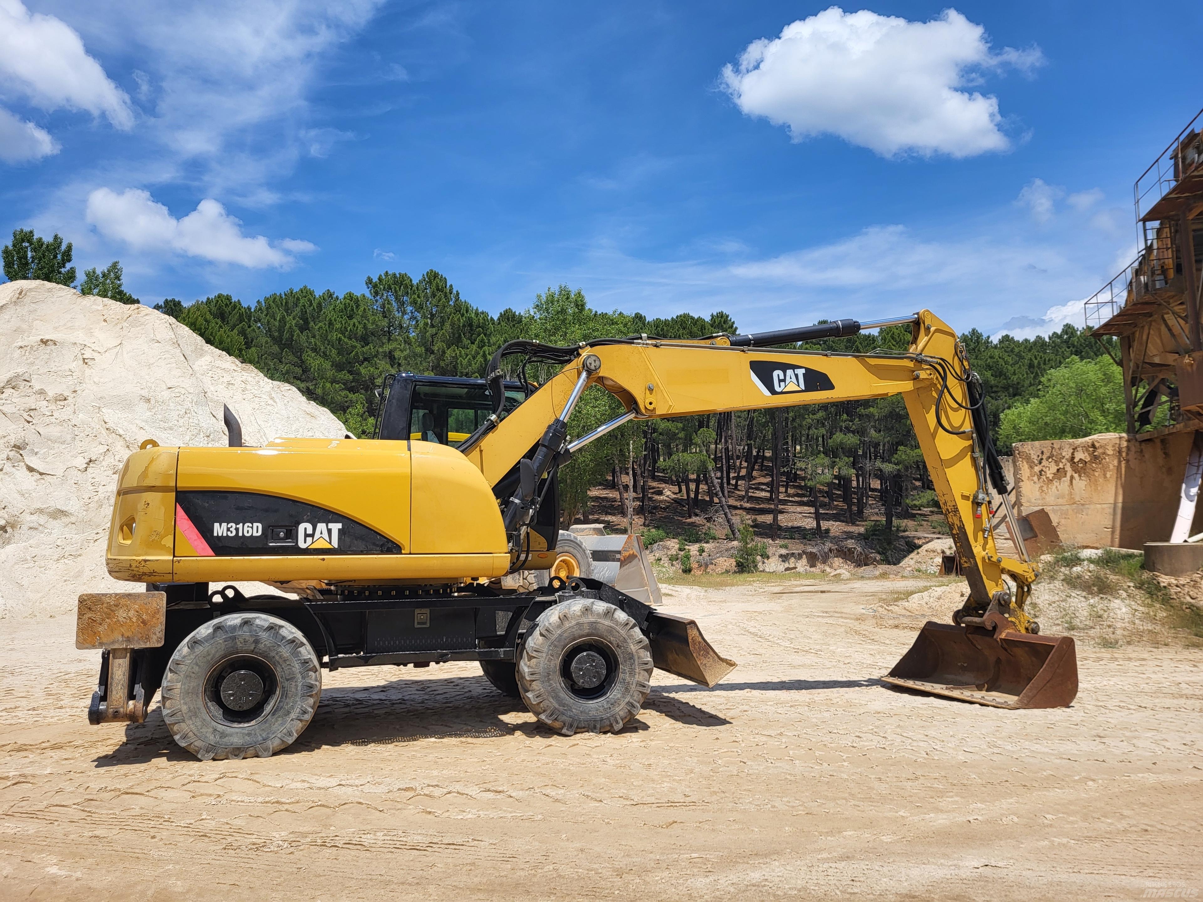 CAT 316d Pelle sur pneus