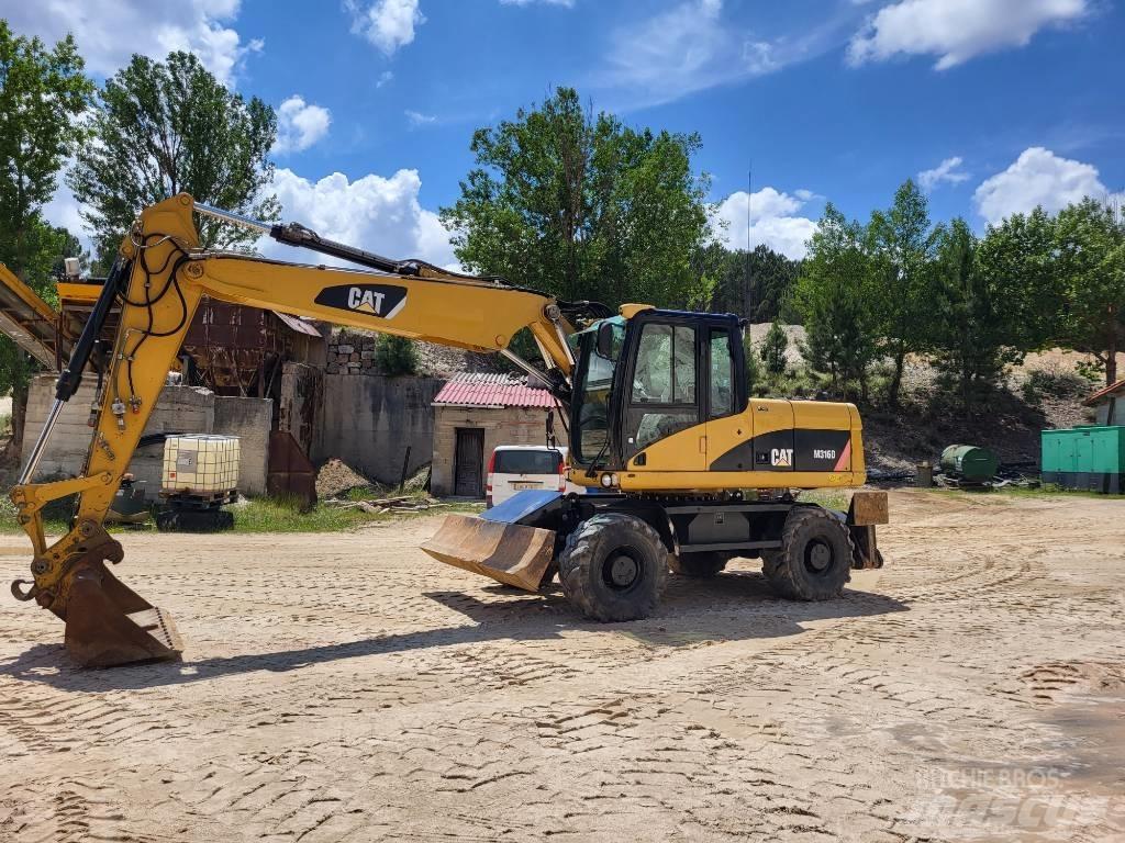 CAT 316d Pelle sur pneus
