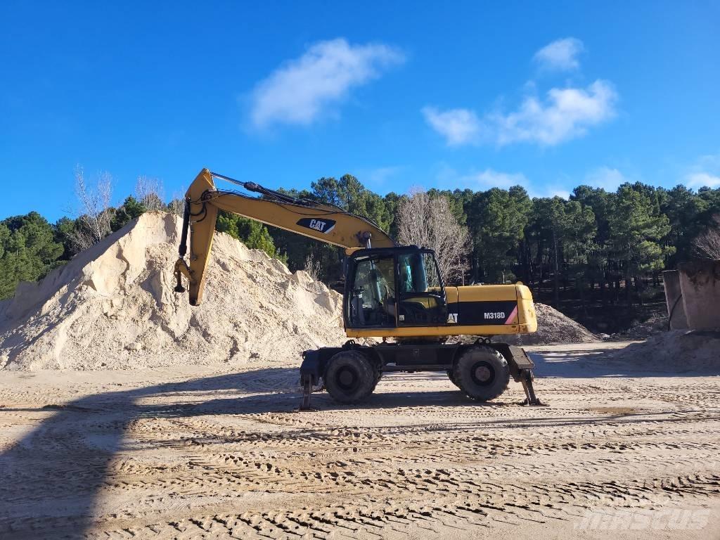 CAT 316d Pelle sur pneus