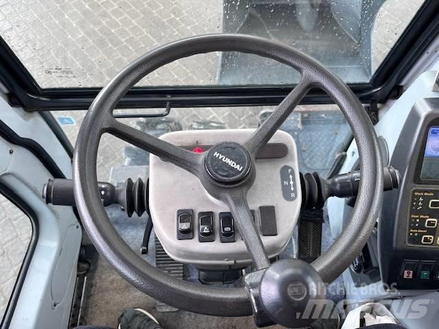Hyundai Robex 140 W Pelle sur pneus