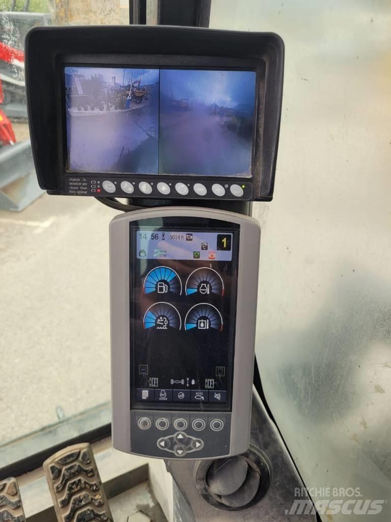 CAT mh3022 Pelle sur pneus