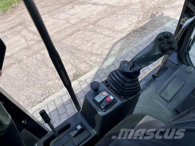 CAT M 315 D Pelle sur pneus