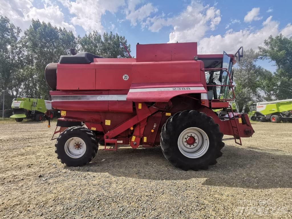 CASE 2388 + heder Moissonneuse batteuse