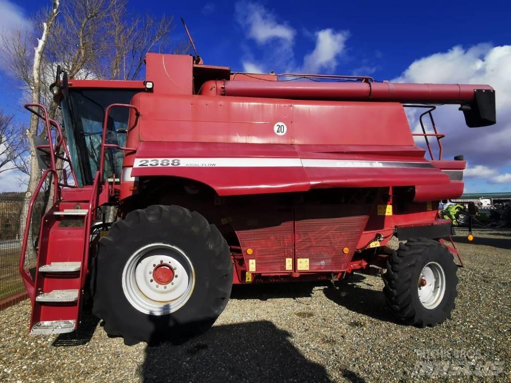 CASE 2388 + heder Moissonneuse batteuse