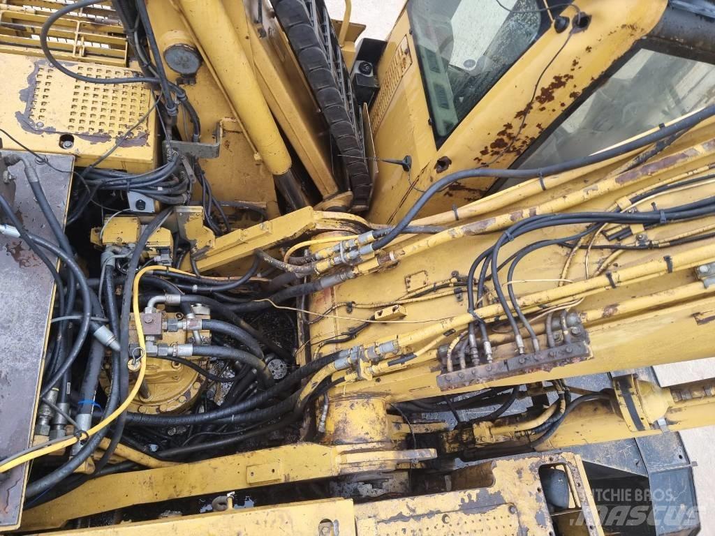 CAT M 325 C L MH Pelle à déchets