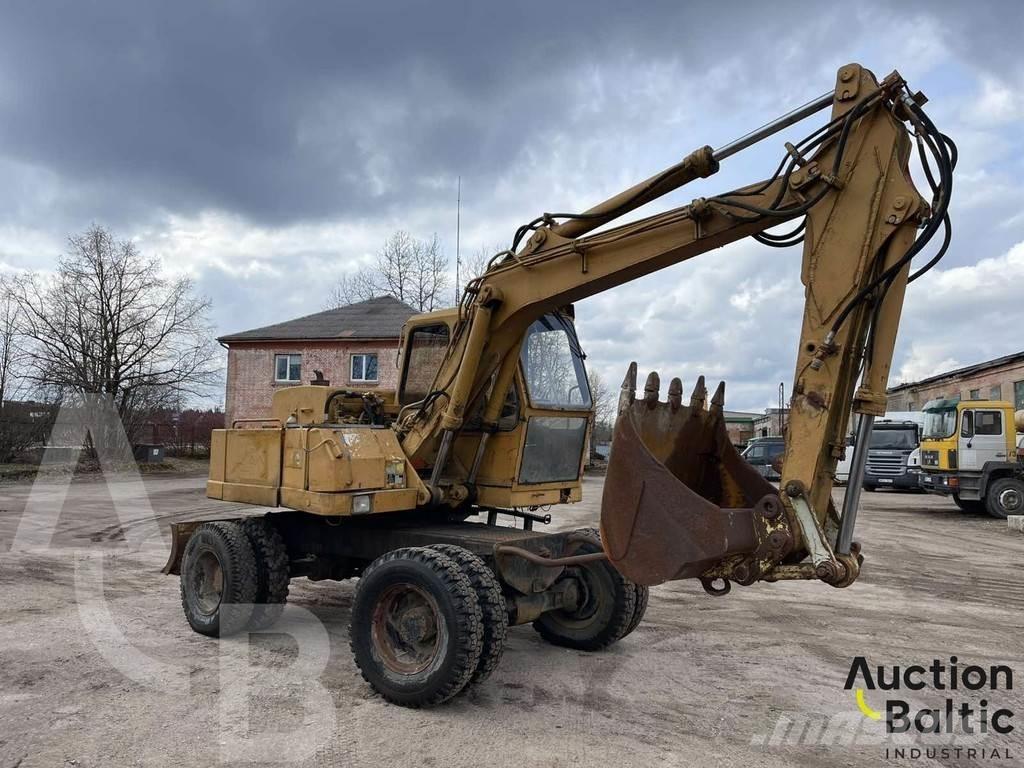 Atlas 1204 Pelle sur pneus